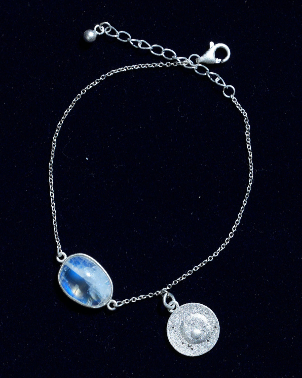 Moonstone bracelet AV-0011, Aquarius, on navy velvet