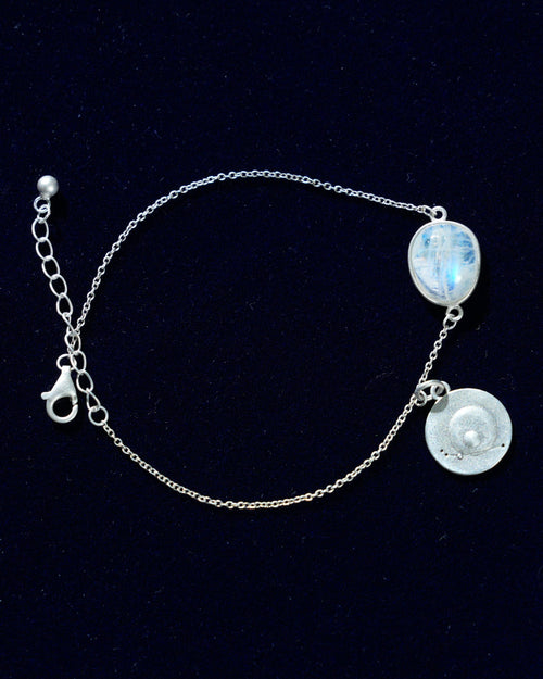 Moonstone bracelet AV-0001, Aries, on navy velvet
