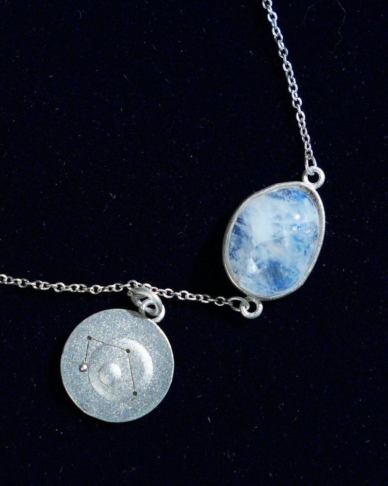 Rainbow moonstone and constellation coin of AV-0007, Libra, close up
