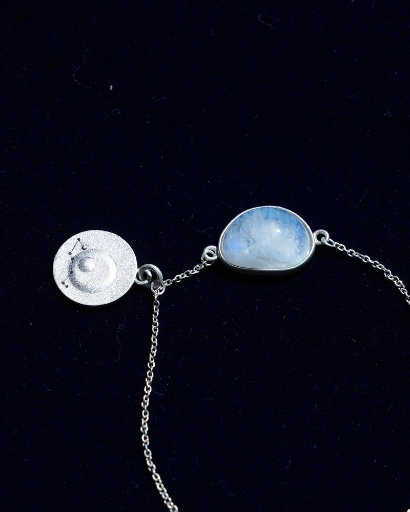 Rainbow moonstone and constellation coin of AV-0016, Scorpio, close up