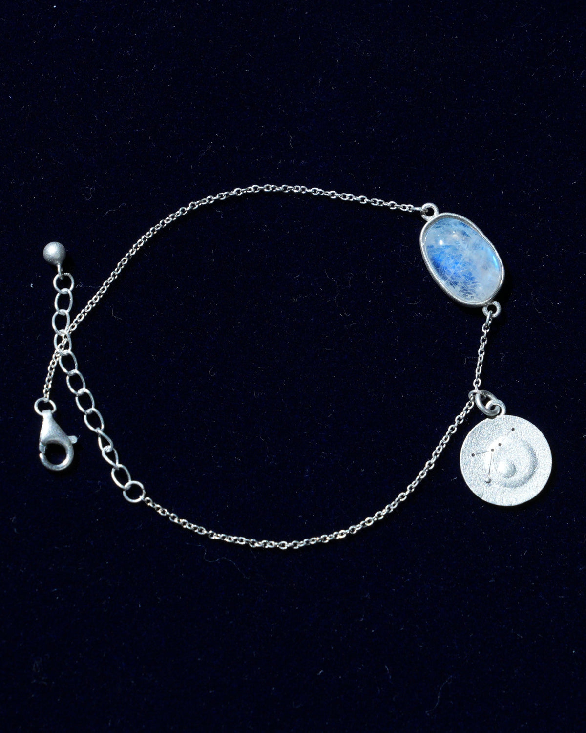 Moonstone bracelet AV-0004, Cancer, on navy velvet