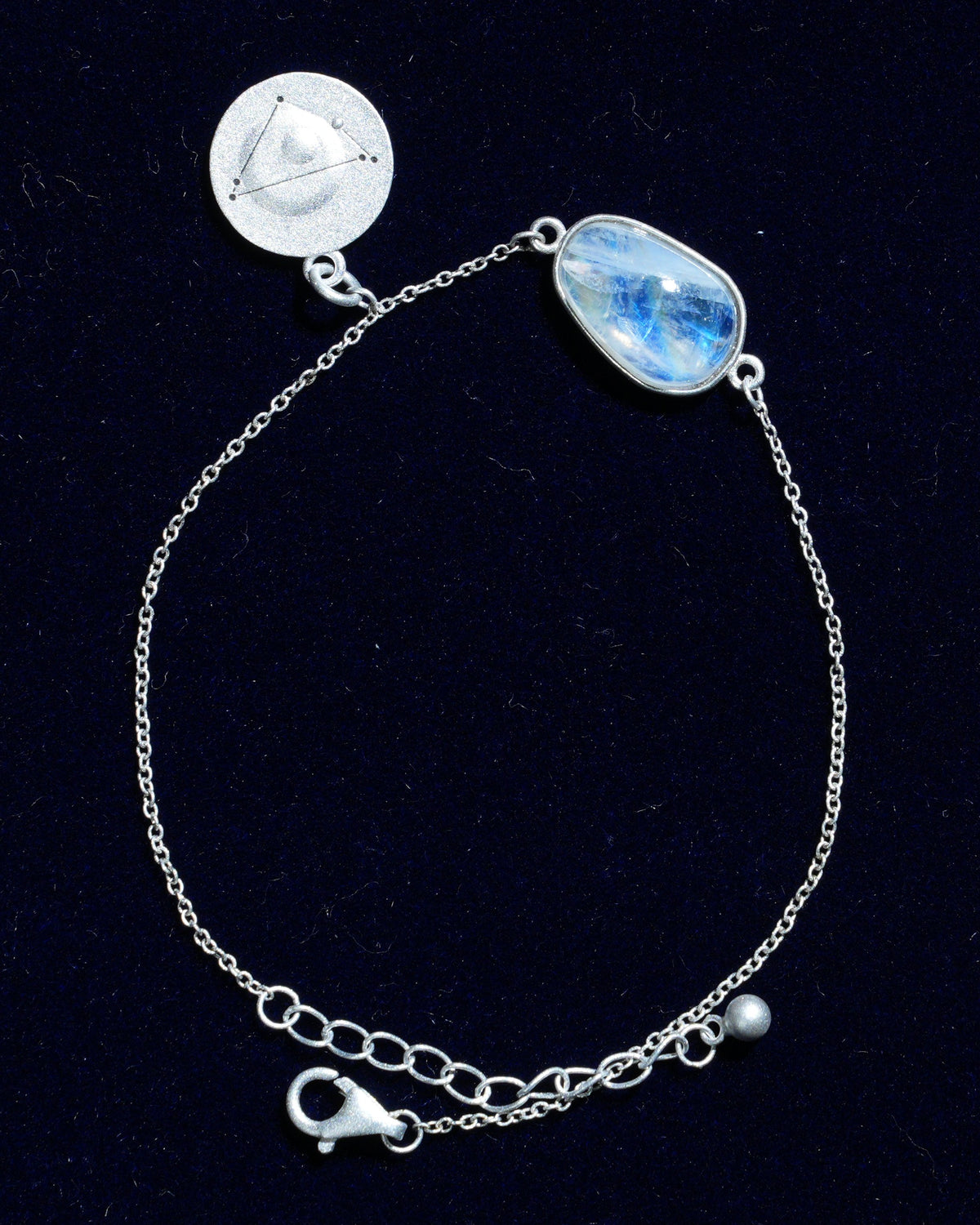 Moonstone bracelet AV-0010, Capricorn, on navy velvet