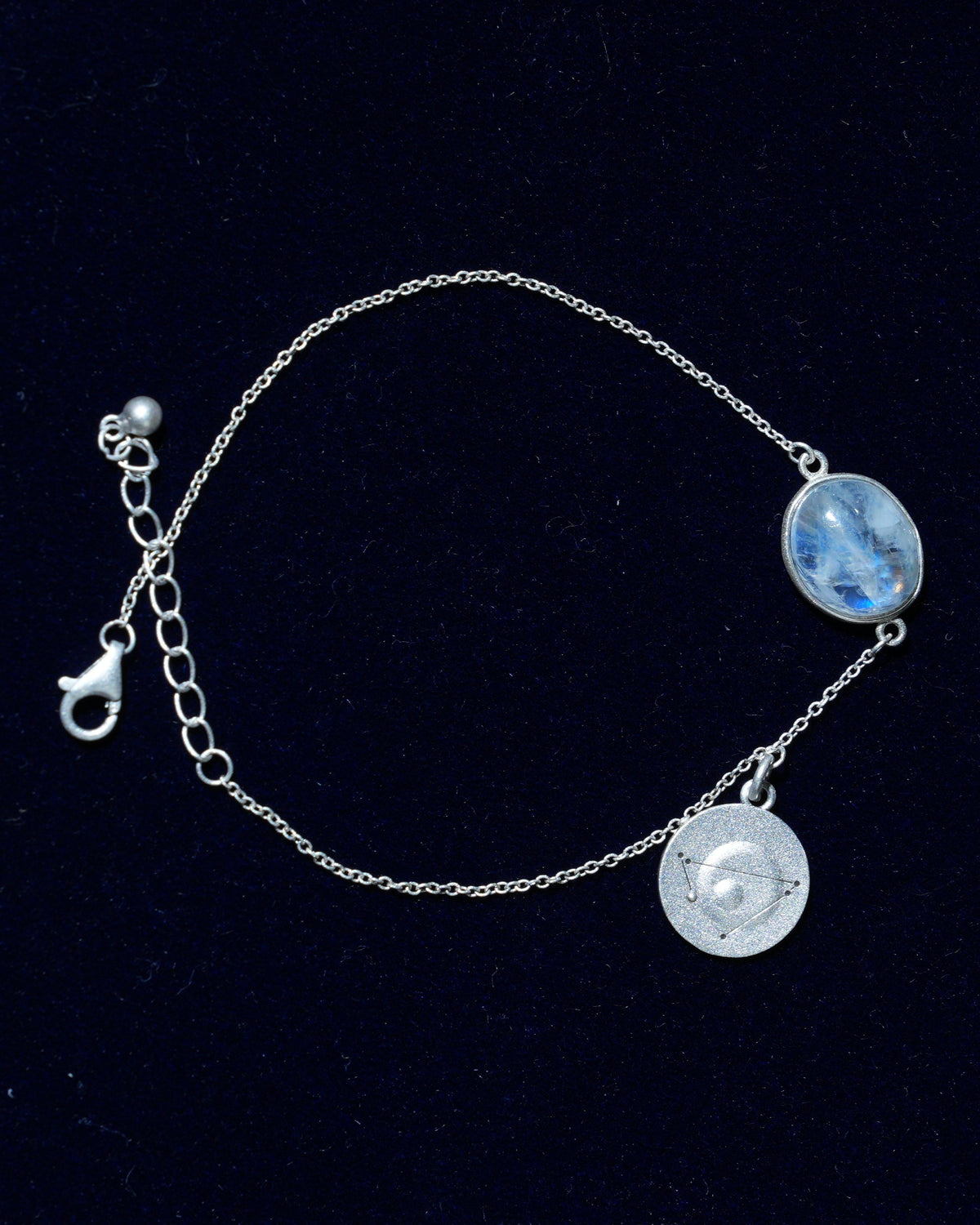 Moonstone bracelet AV-0021, Capricorn, on navy velvet