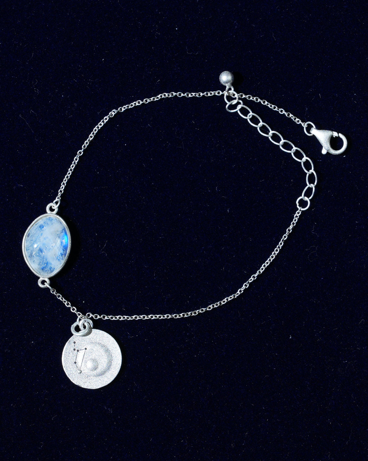 Moonstone bracelet AV-0015, Leo, on navy velvet