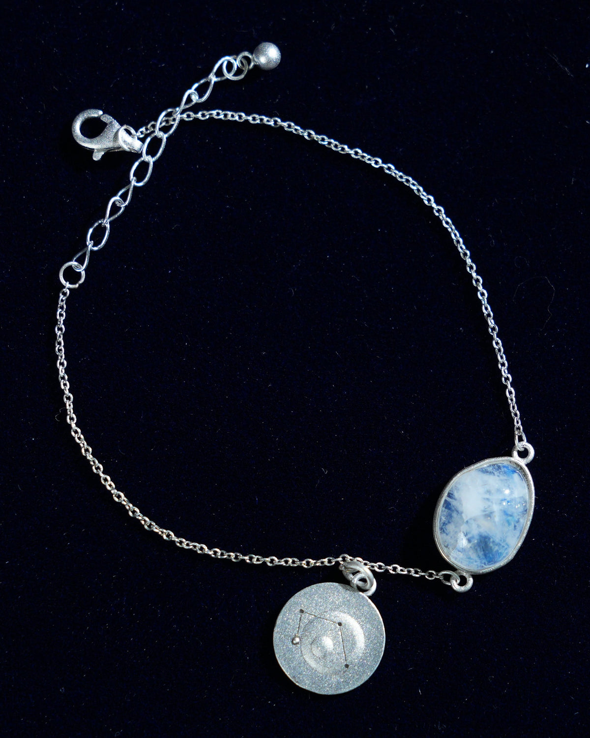 Moonstone bracelet AV-0007, Libra, on navy velvet