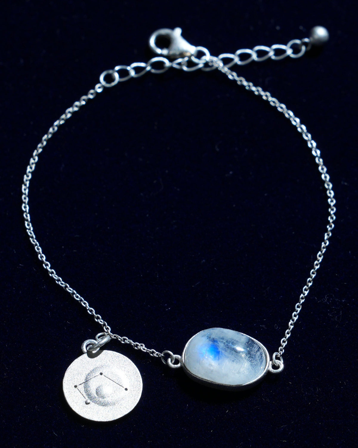 Moonstone bracelet AV-0035, Libra, on navy velvet