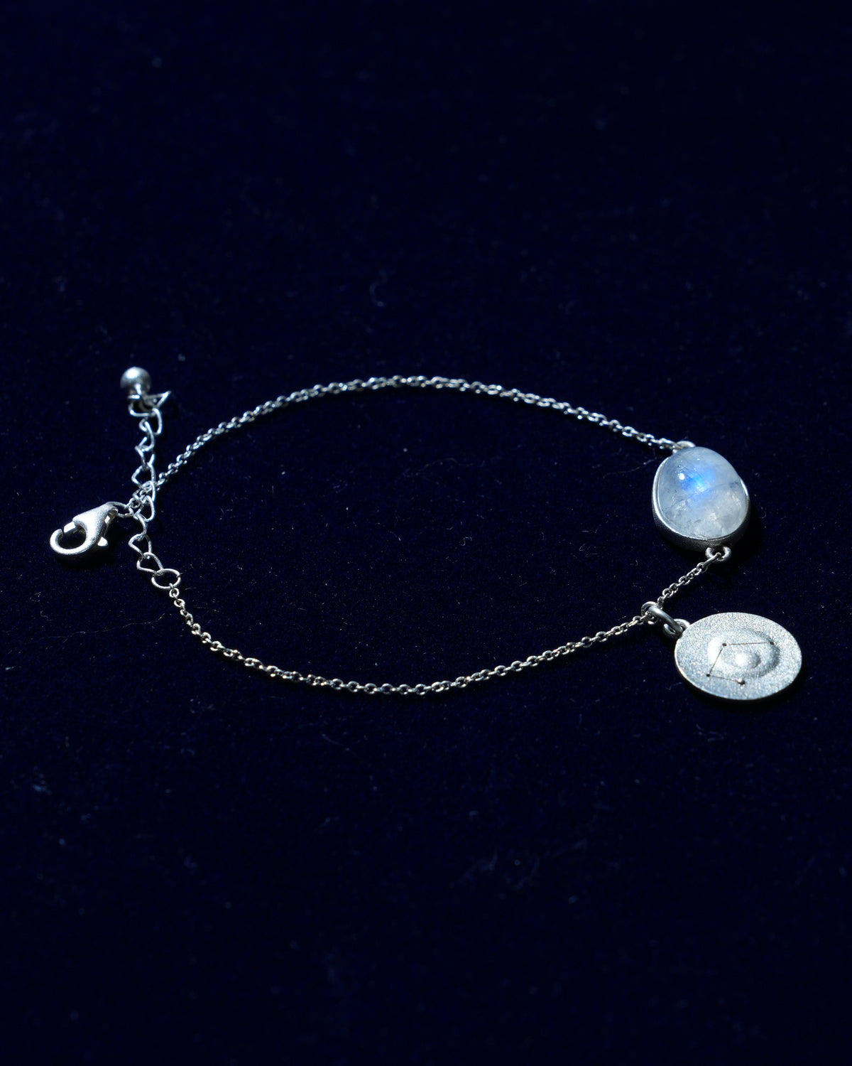 Moonstone bracelet AV-0044, Libra, on navy velvet