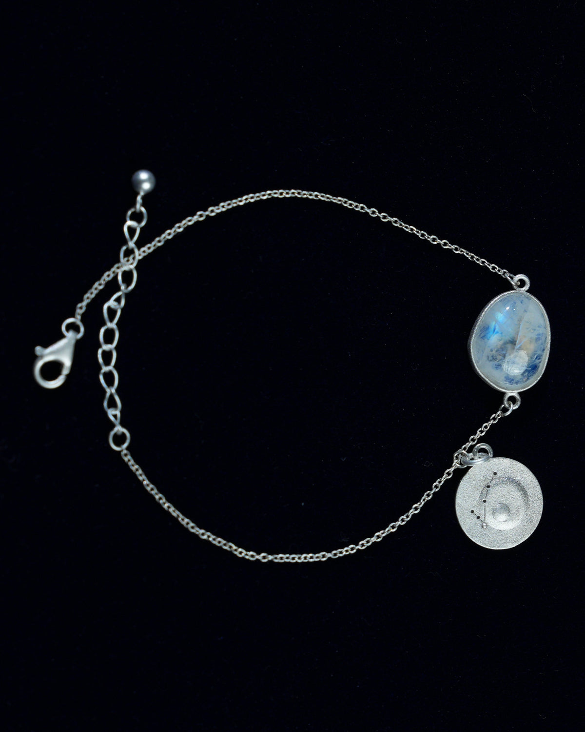 Moonstone bracelet AV-0012, Pisces, on navy velvet