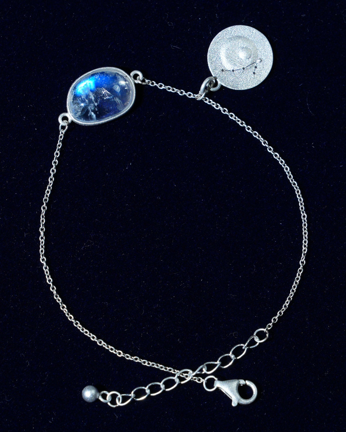 Moonstone bracelet AV-0013, Pisces, on navy velvet