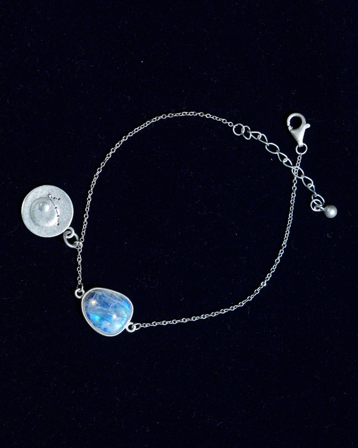 Moonstone bracelet AV-0018, Pisces, on navy velvet