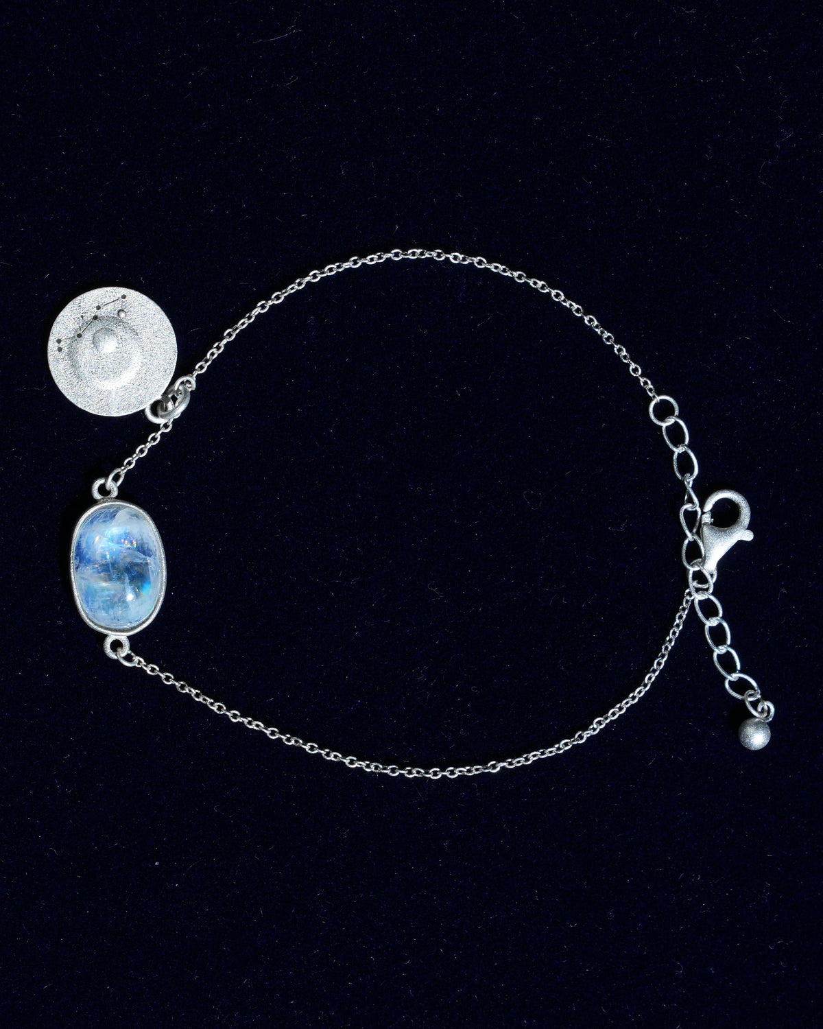 Moonstone bracelet AV-0014, Scorpio, on navy velvet