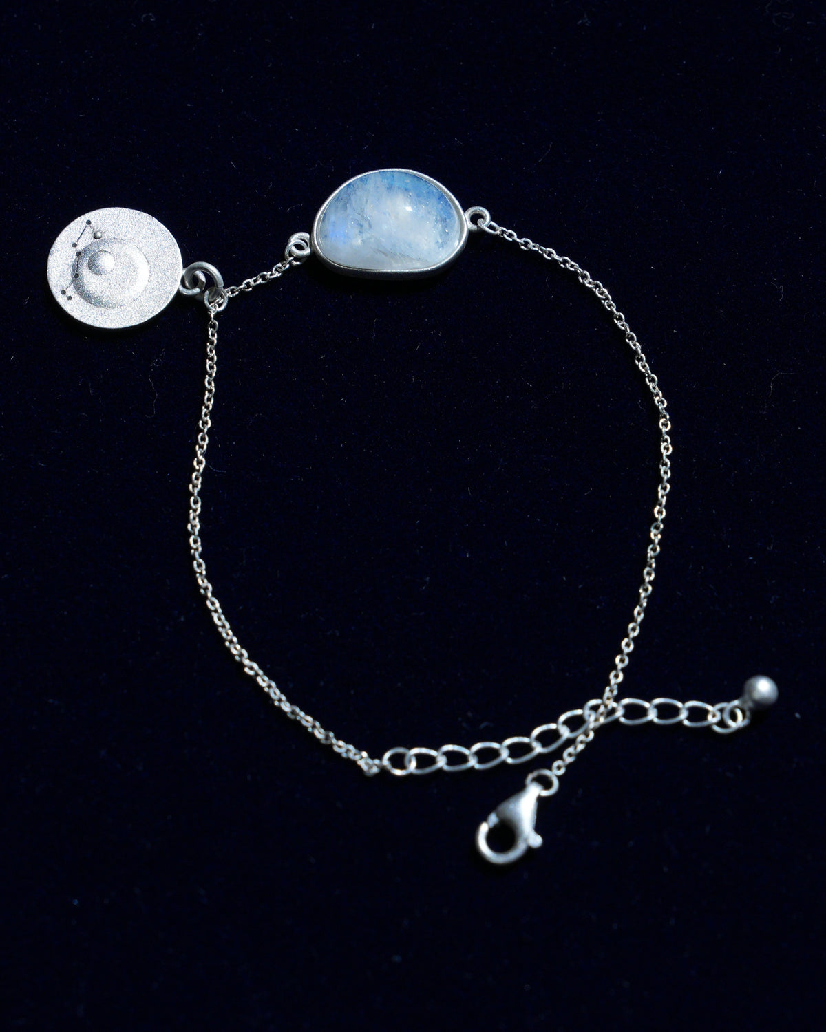 Moonstone bracelet AV-0016, Scorpio, on navy velvet
