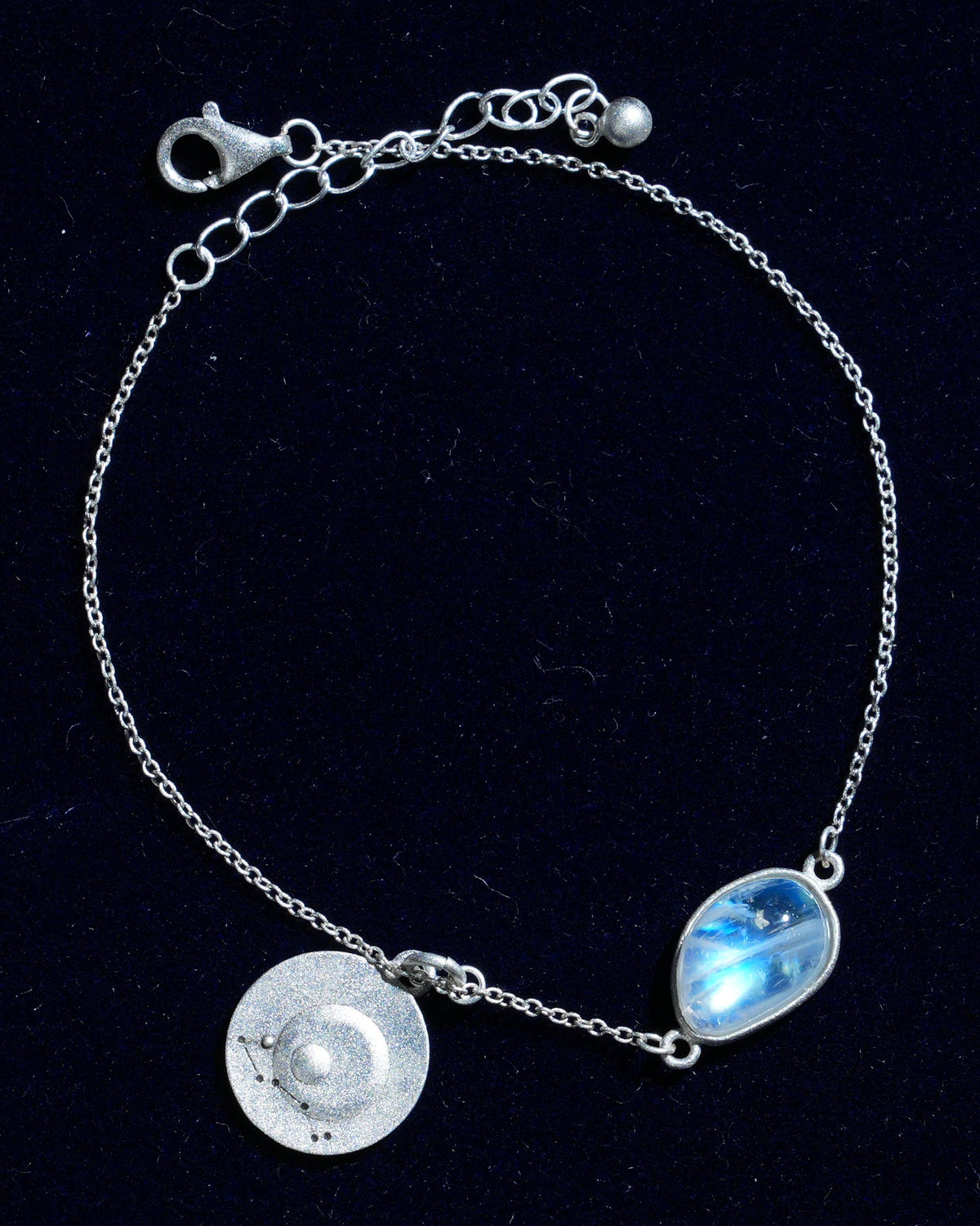 Moonstone bracelet AV-0041, Scorpio, on navy velvet