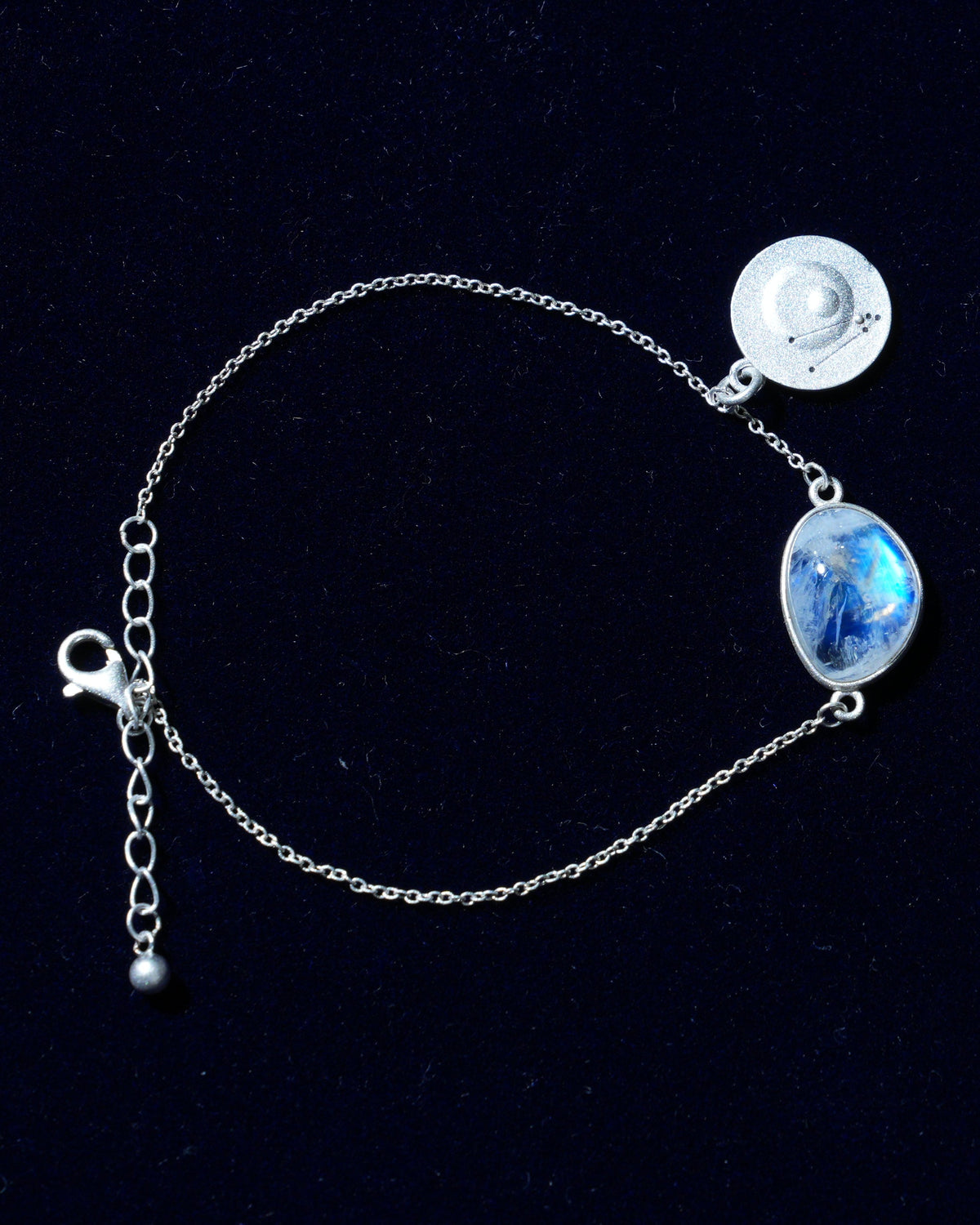 Moonstone bracelet AV-0026, Taurus, on navy velvet