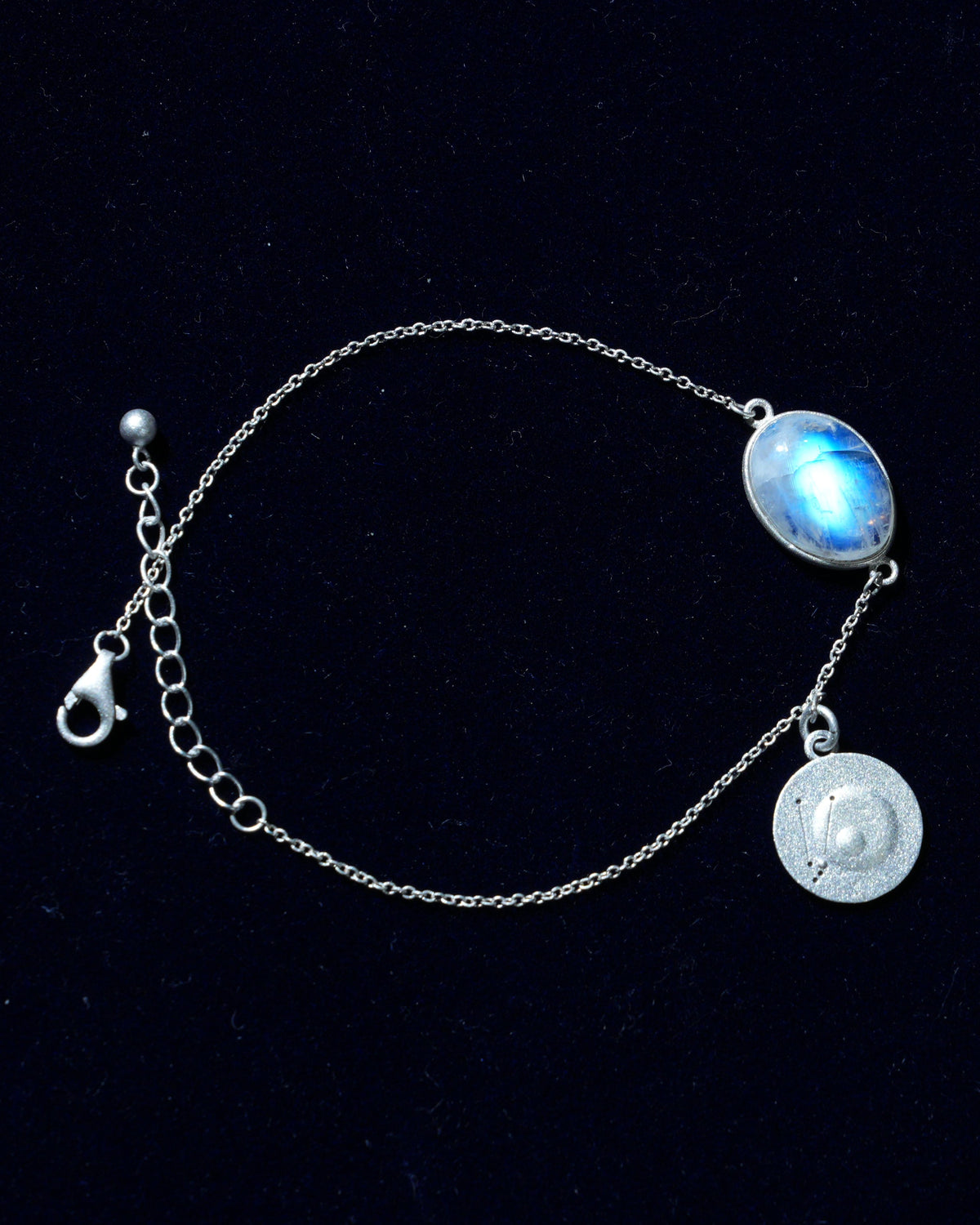 Moonstone bracelet AV-0045, Taurus, on navy velvet