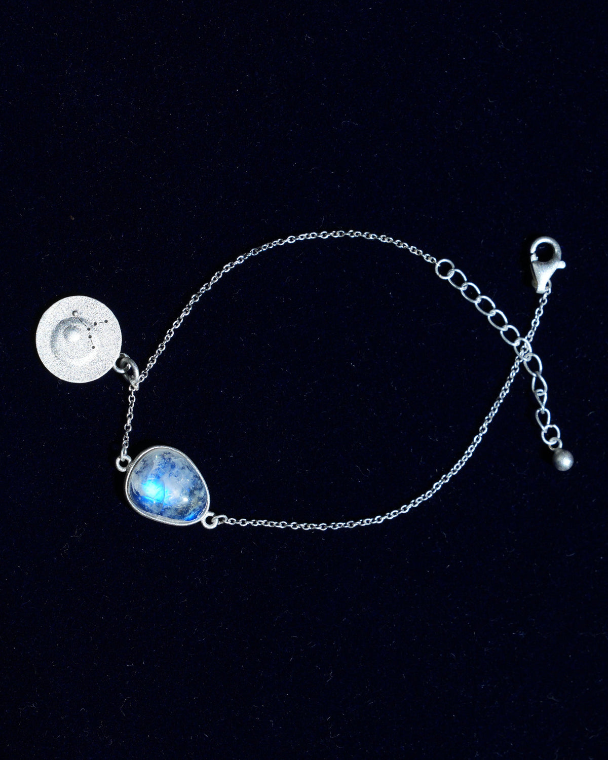 Moonstone bracelet AV-0017, Virgo, on navy velvet