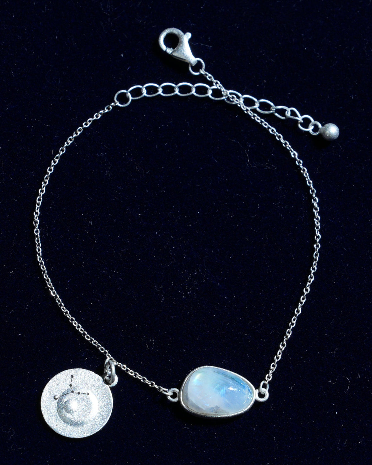 Moonstone bracelet AV-0030, Virgo, on navy velvet