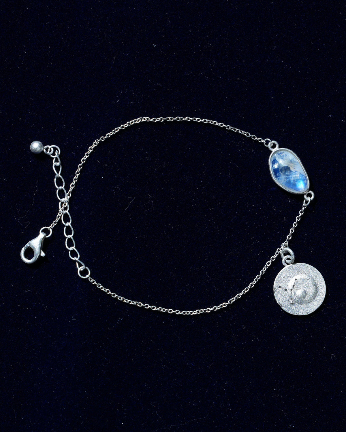 Moonstone bracelet AV-0043, Virgo, on navy velvet